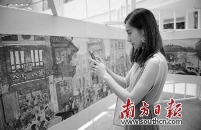 12米長的《霸氣西關(guān)圖》作品在廣州萬菱匯展出，勾起了“老廣”的回憶。南方日?qǐng)?bào)記者 肖雄 攝