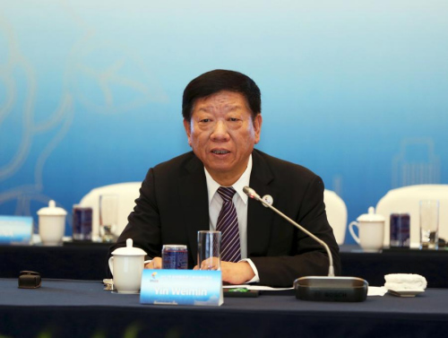 圖為人力資源和社會(huì)保障部部長(zhǎng)尹蔚民致辭。主辦方供圖