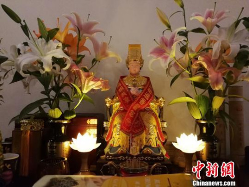 許明良家里供奉的湄洲媽祖。林群華攝。