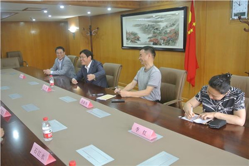 中國僑網(wǎng)王主任會見李建平一行